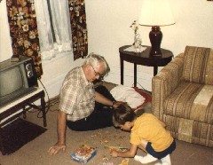 father Bruce Dorrough; Andy McDougal; Family Parents